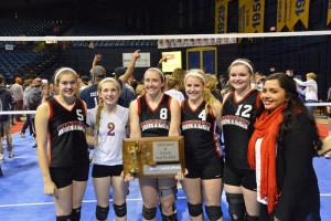 Huntley Project's 2015 Volleyball Seniors- (left to right) Lauren Frieling, Faith Taylor, Tessa Hultgren, Keera Stookey, Kenzie Smidt, and Senior Student Manager Angelica Jones displaying the newly won 2nd Place Trophy at the State Class B Volleyball Tournament. 